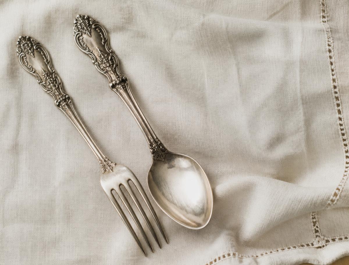 Ornate antique silver plate fork and spoon with floral scrollwork handles